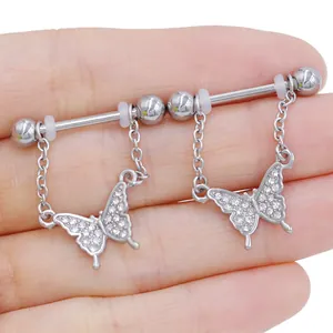 Detail shot of silver butterfly nipple rings with sparkling zircon inlay for women
