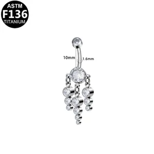 Macro shot of F136 titanium belly ring with dangling white zircon and 1.6mm bar thickness