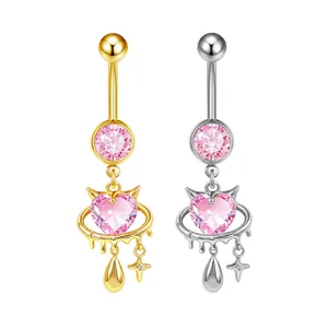 Detail of pink heart belly rings in gold and silver finish with drip gothic frame