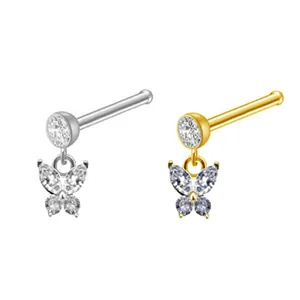 Detail of butterfly nose studs with sparkling cubic zirconia in silver and gold plating