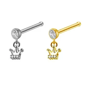L-shaped titanium nose studs with crown charms and cubic zirconia in silver and gold
