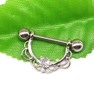 Silver steel nipple ring featuring a lace design with sparkling round zirconia stones