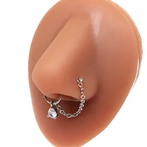 Polished stainless steel nose ring chain featuring a sparkling teardrop zircon pendant