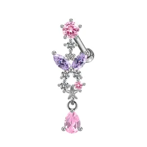 Macro detail of belly ring featuring pink pear drop and purple butterfly wings design