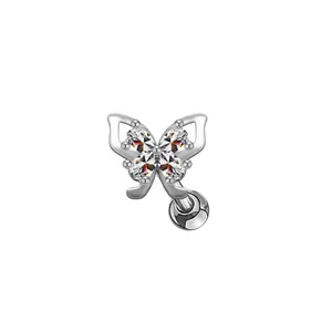 Macro view of silver butterfly stud with four oval zircons and screw-back ball closure