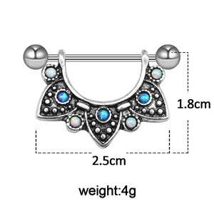 Detailed view of silver steel nipple ring featuring blue and white opal stones inlay