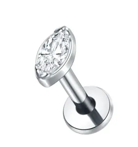 Macro view of titanium labret stud with marquise-cut marquise stone and flat back design