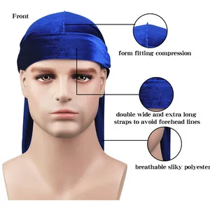 Detail of royal blue velvet durag featuring extra wide straps and reinforced stitching