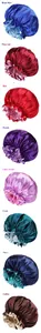 Detail view of large double-layer satin sleep caps in eight vibrant assorted colors