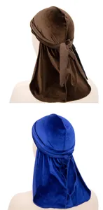 Detail of blue and brown velvet durags with long straps for wave hair maintenance