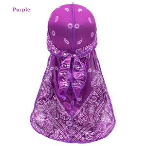 Men's purple paisley durag with long tail featuring silky satin fabric and premium print