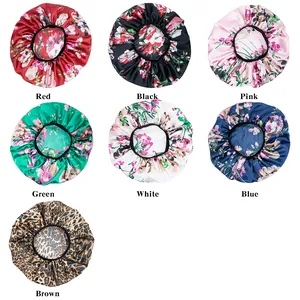 Adjustable satin sleep bonnets in various floral and leopard prints with elastic bands