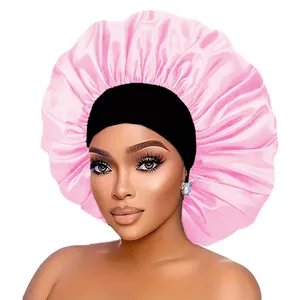 Pink satin hair bonnet with black wide elastic band for sleeping and curly hair care
