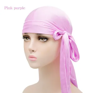 Silky pink purple durag for men and women featuring long straps and glossy satin finish