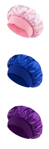 Three satin sleep caps in pink, royal blue, and purple with wide elastic hair bands