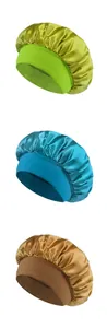Close-up of three satin sleep bonnets in green, blue, and bronze with elastic wide bands