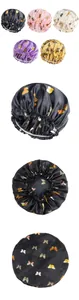 Detail view of butterfly print satin sleep caps in five colors with elastic bands