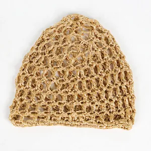Detailed view of the hollow mesh structure on a golden brown crochet knit hair net cap