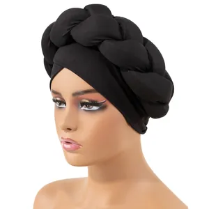 Turbante nero intrecciato in stile etnico in morbido tessuto elastico per donna
