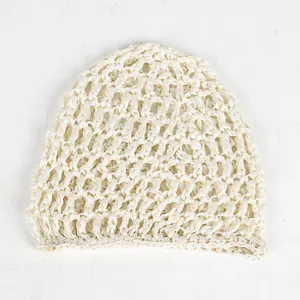 Detailed close-up of cream crochet hair net cap showing hollow mesh texture and border