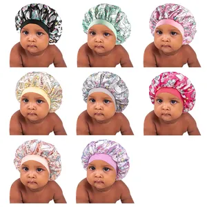 Infant satin sleep caps featuring cute cartoon unicorn and star prints in eight colors