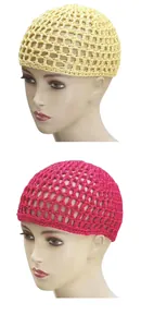 Close-up of handmade crochet hollow mesh hair net cap in yellow and rose red knit