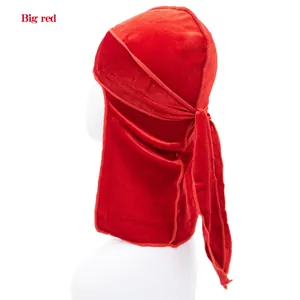 Detail view of red velvet kids durag with long straps and soft premium texture