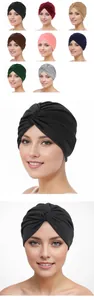 Detailed view of elastic twisted turban hats for women in multiple solid colors
