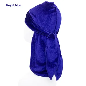 Detail view of royal blue velvet durag with high-quality stitching on a model head