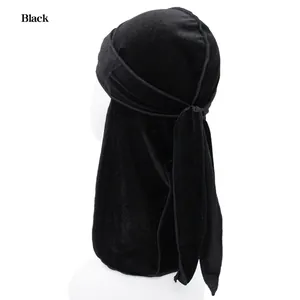 Detail of premium black velvet durag with long ties on a model mannequin head