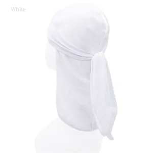 Detail view of white velvet durag with long straps on a model head for kids