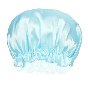 Close-up of light blue satin sleep cap showing glossy fabric texture and elastic hem