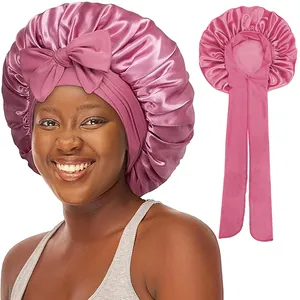 Bonnet de nuit en satin rose avec longs rubans ajustables et nœud pour soin des cheveux