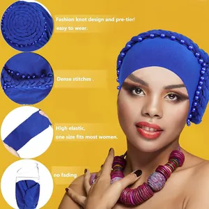 Turbante blu reale da donna con motivi intrecciati ed eleganti decorazioni in perline