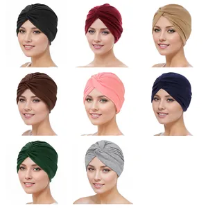 Elastic turban hats for women featuring a stylish front cross knot in eight solid colors