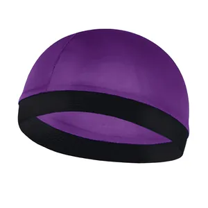 Detail of purple silk wave dome cap with flat-seam stitching and black elastic band