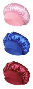 Detail of satin hair bonnets with rhinestones in pink, blue, and red colors