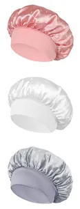 Three satin sleeping caps with rhinestones and wide elastic bands in various colors