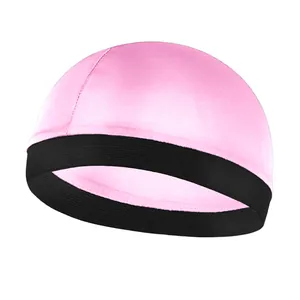 Detailed view of pink silk wave dome cap featuring a high-elastic black hem for children