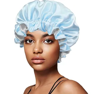 Close-up of light blue double-layered satin bonnet with elastic ruffled edge on model