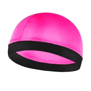 Close-up of pink wave dome cap with black elastic band and high-quality fabric texture