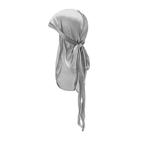 Detail of silver silky durag showing long tail ties and smooth metallic satin texture