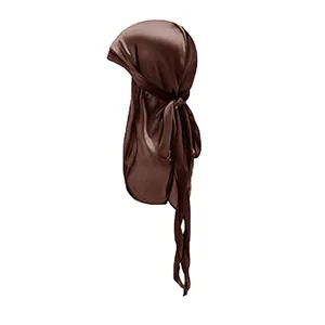 Detail of coffee brown silky durag featuring glossy satin texture and long tail ties