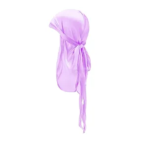 Detail of lavender silky durag showing smooth satin texture and long tail knotting