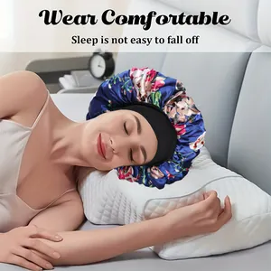 Floral satin sleep bonnet with wide elastic band for hair protection in royal blue color