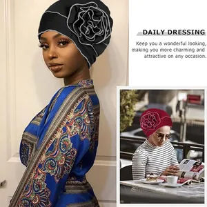 Women's stretch turban hat with large side flower and elegant silver piping detail