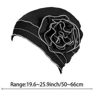 Elastic black turban flower hat with grey trim, fits head sizes 19.6-25.9 inches