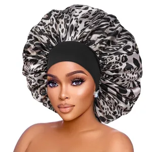 Macro detail of leopard print satin bonnet with wide black elastic stretch headband