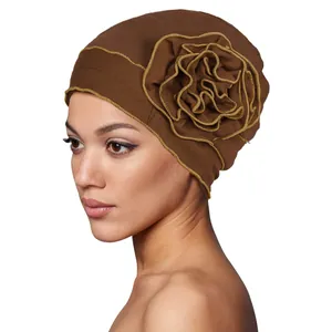 Damen Turban in Braun mit großer 3D-Blume und gelben Kontrastnähten an den Blütenrändern