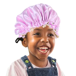 Adjustable pink satin hair bonnet for kids featuring elastic edge and black drawstring buckle